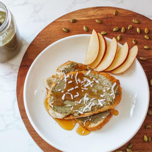 pumpkin seed butter n toast with apple slices and jar