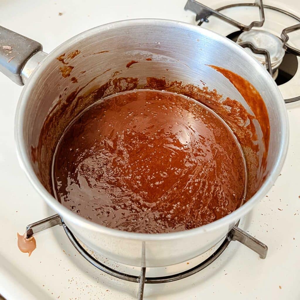 chocolate ganache melting in pot