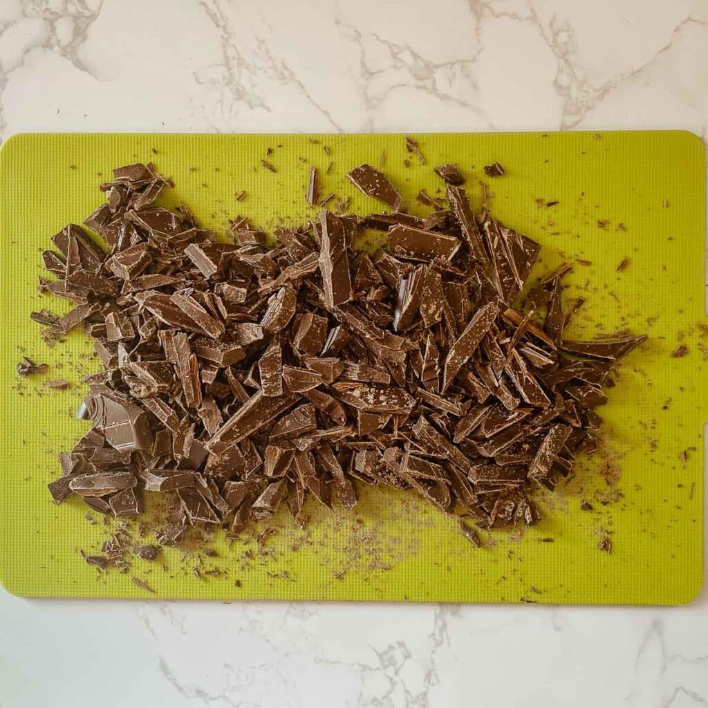 chopped chocolate on cutting board