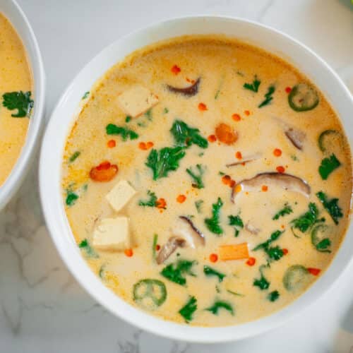 vegan tom kha soup in two bowls