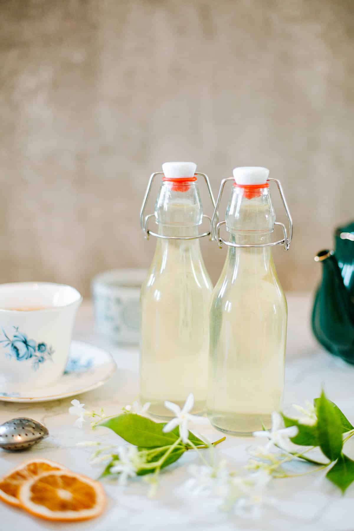 jasmine simple syrup in fliptop bottles