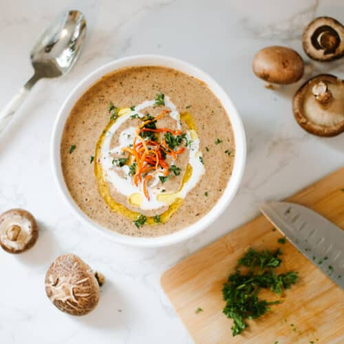 gluten free cream of mushroom soup with chopped parsley on side