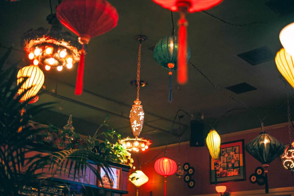 lanterns hanging in the Cypress Room hallway in McMenamin's Kennedy School in Portland