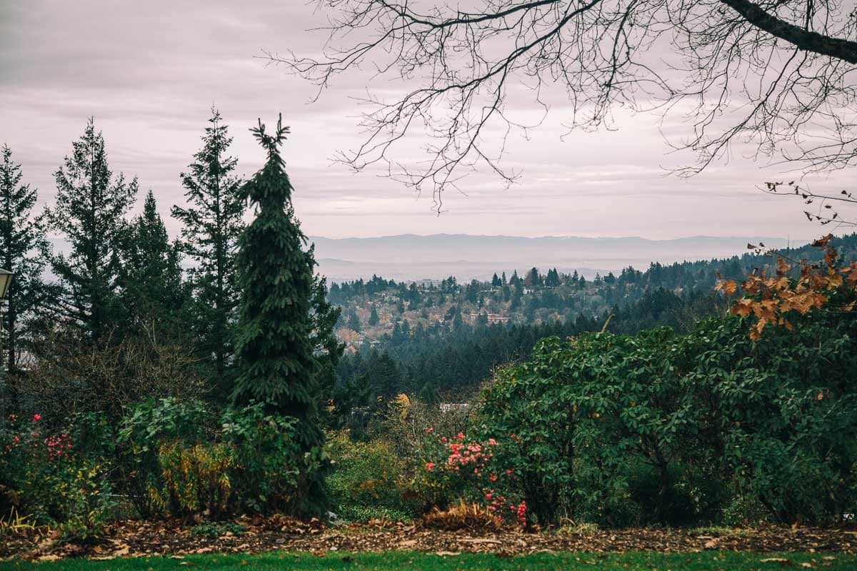 view of hills and forest behind the Pittock Mansion in Portland, Oregon