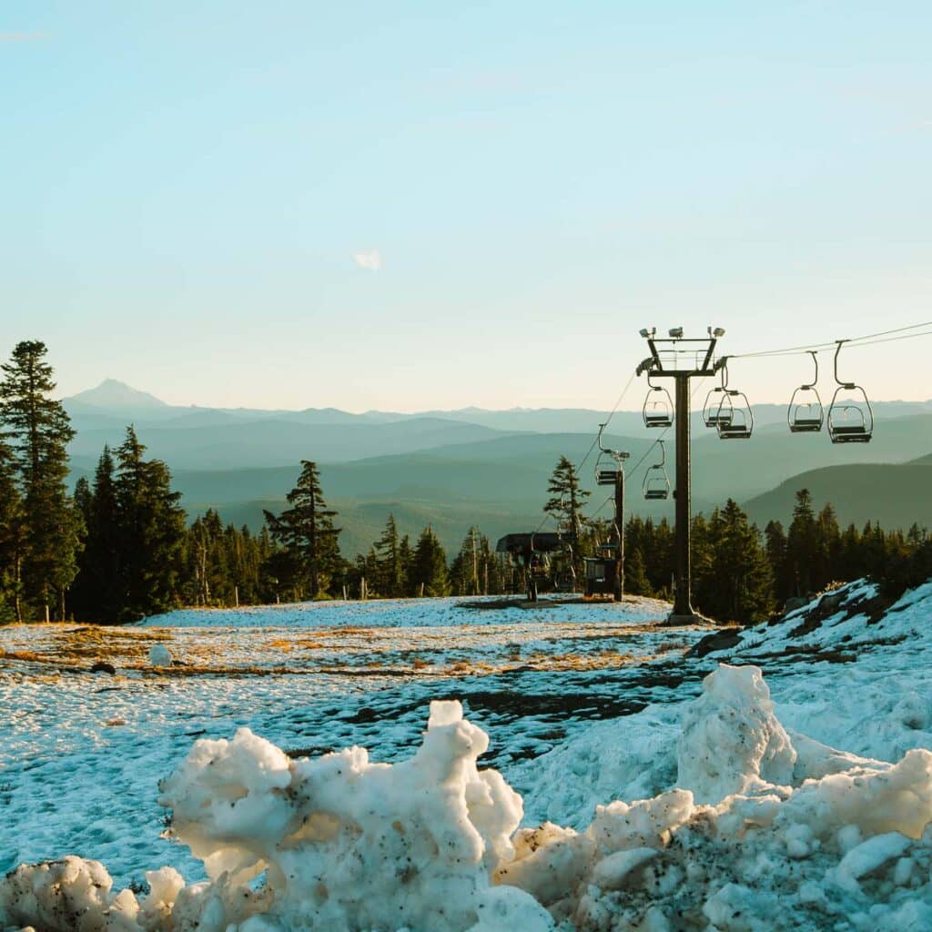 ski lift amid snow and trees at the Timberline Lodge