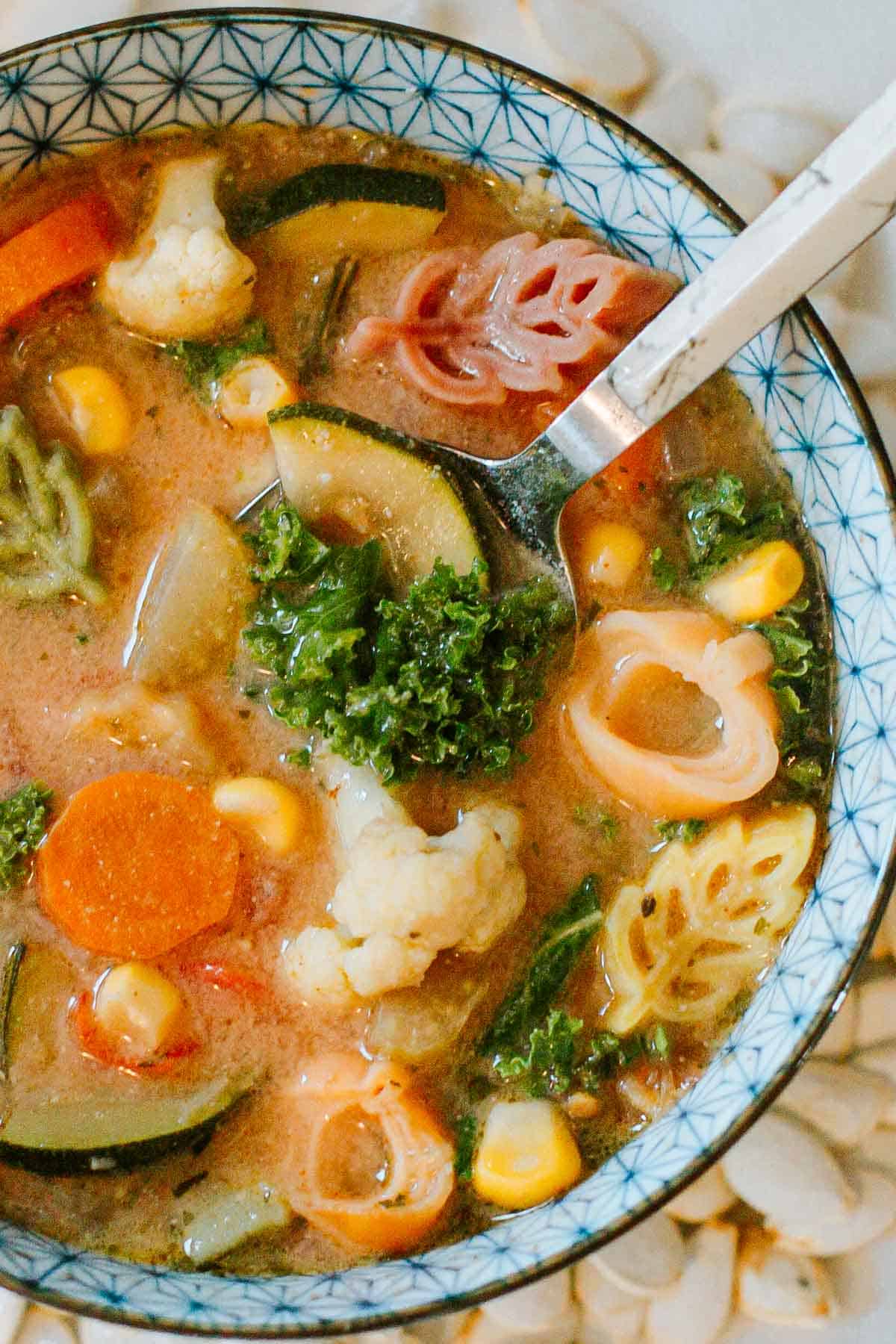 10 vegetable soup closeup with spoon
