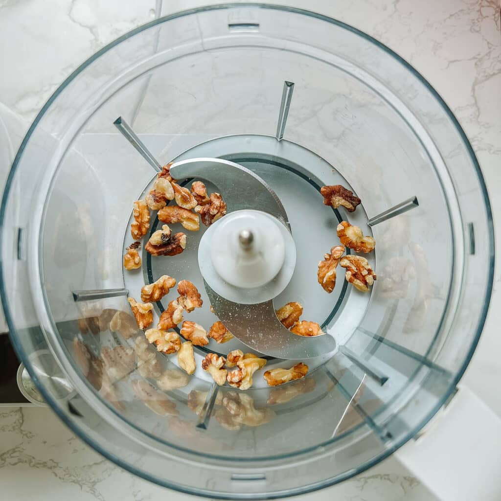 walnuts before pulsing in food processor