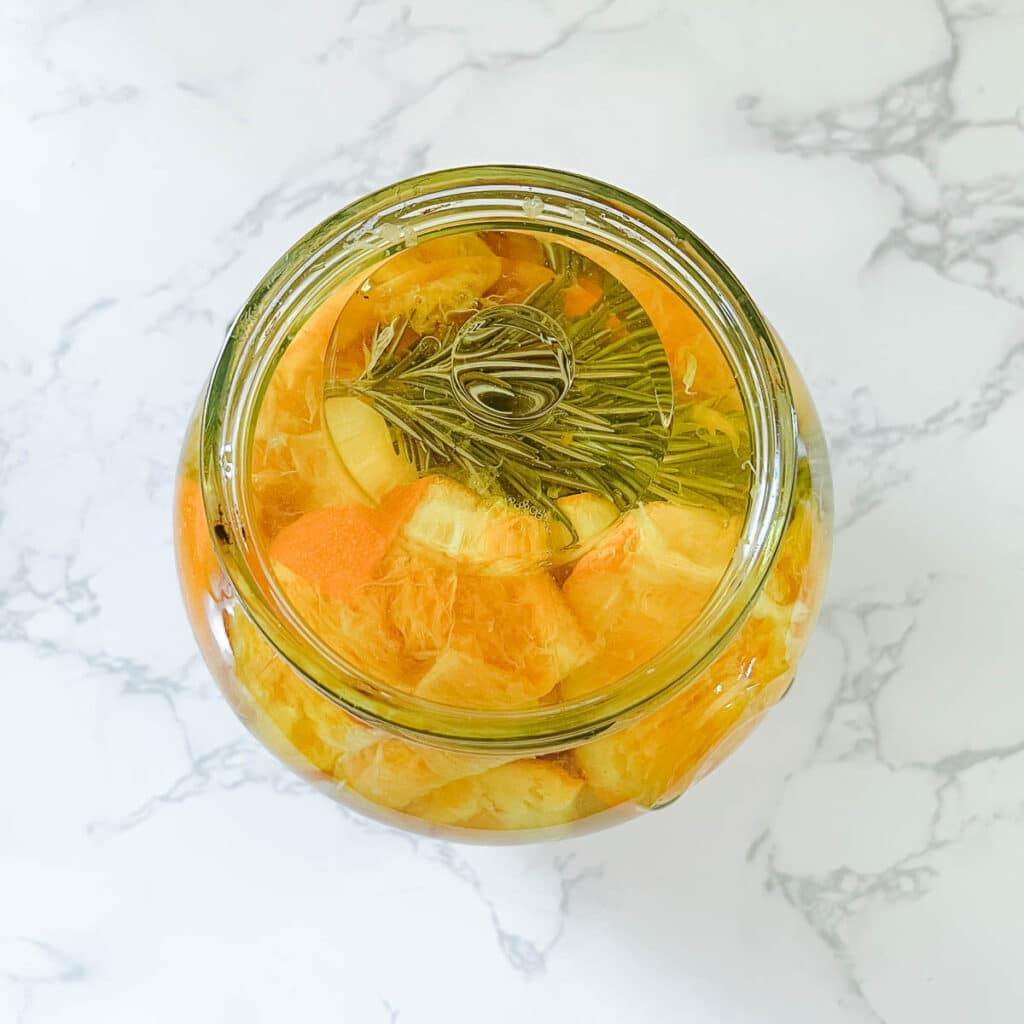 finished product in jar with fermentation weight