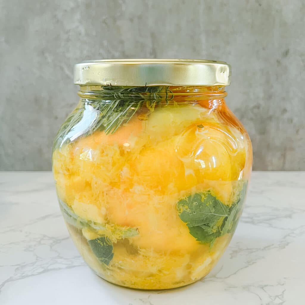 orange & vinegar cleanser ingredients in jar
