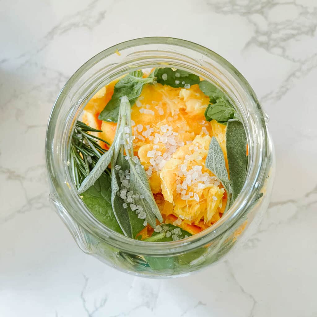 jar of orange peels, herbs, salt