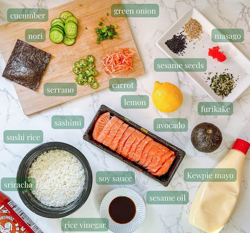 sushi bowl ingredients (salmon, rice, veggies, sauces, etc.)