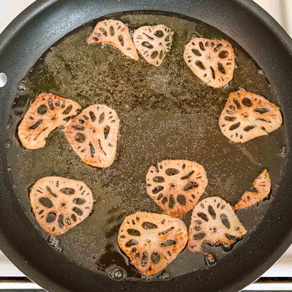 lotus root chips after frying (now smaller and darker).