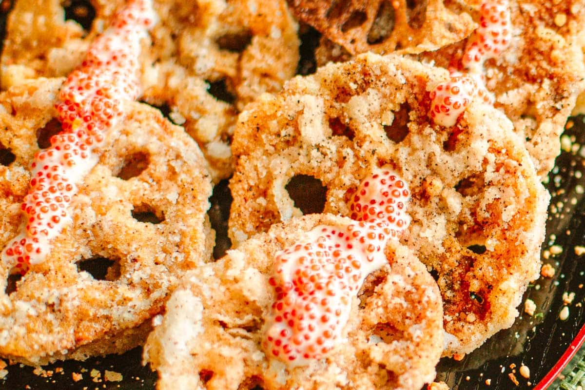 fry lotus root topped with drizzle of masago sauce.