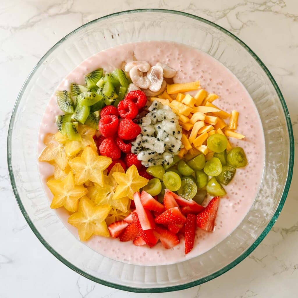 fresh fruit ingredients all added to coconut milk sago.